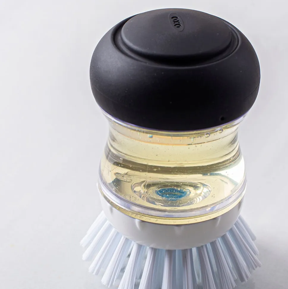 OXO Good Grips Soap Dispensing Palm Brush